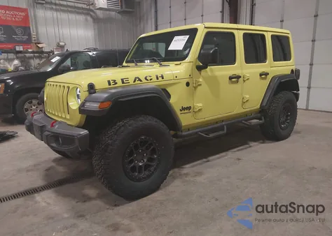 2022 Jeep Wrangler Unlimited High Tide 4X4 z USA, uszkodzony, nr VIN 1C4HJXDG9NW243097